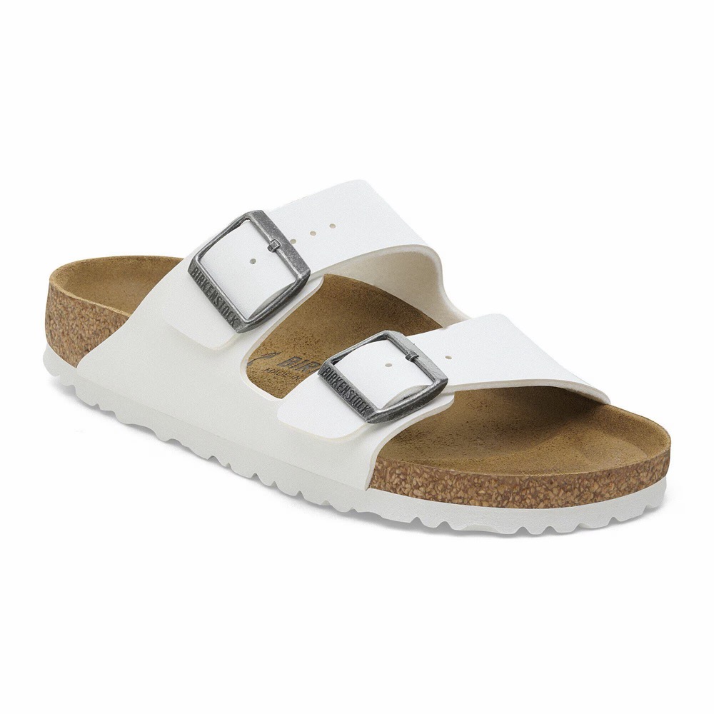 White leather two-strap slide sandal with buckles on a cork footbed