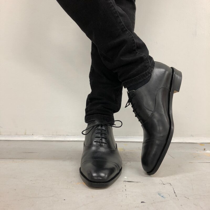 Handmade black leather cap-toe oxford shoes